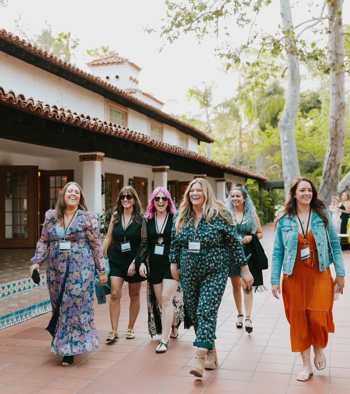 group of women confidently walking into conference at rancho las lomas in california